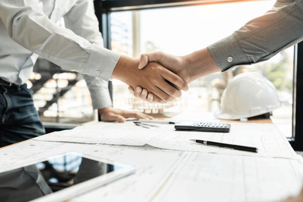 Construction professionals collaborating on project planning